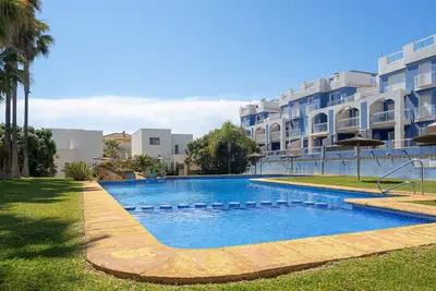 Image de Appartement 'Precioso Playa Oliva' avec piscine privée, Wi-Fi et climatisation