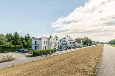 Image de Vacation apartment directly behind the dike