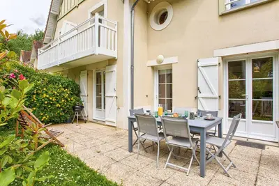 Image de Maison de vacances pour 6 personnes à 600m de la plage avec terrasse et jardin, idéale en famille