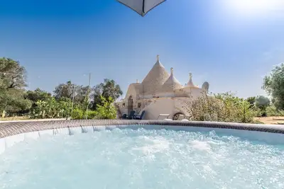 Image de Maison de vacances 'Il Trullo Di Mariangela' avec jardin privé, Wi-Fi et climatisation