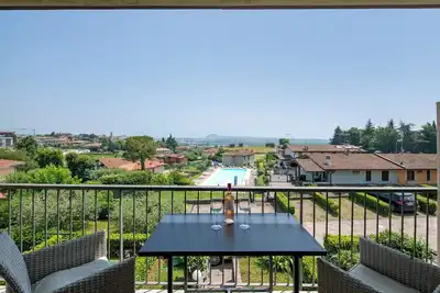 Image de Appartement 'La Finestra Sul Garda' avec vue sur le lac, Wi-Fi et climatisation