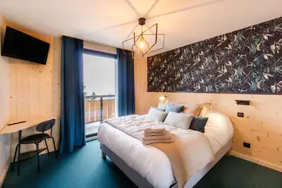 Image de Appartement \"Lodge Six De Savoie\" avec vue sur les montagnes, terrasse privée et Wi-Fi