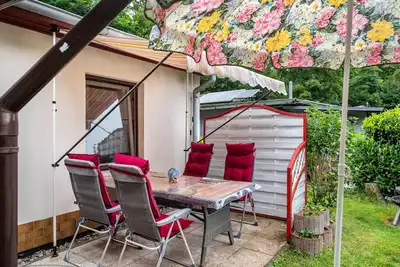 Image de Maison de vacances 'Haus Seeblick' avec terrasse et jardin privés