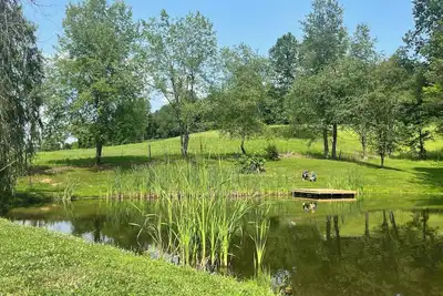 Image de Cozy home in a peaceful country setting with stocked pond. Relax and unwind.