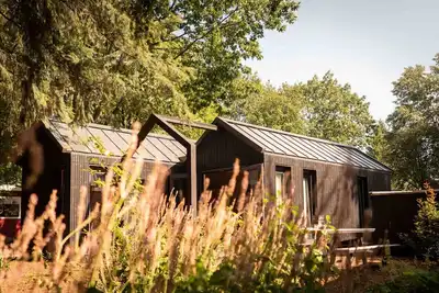 Image de Hytte, which is Norwegian for cabin or (wooden) house in nature.