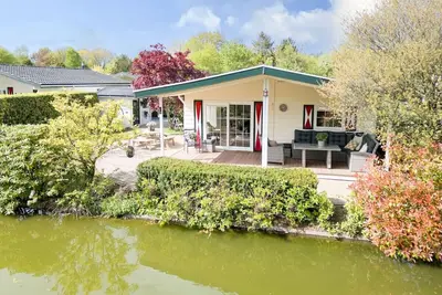 Beautiful holiday home by the water | Large garden