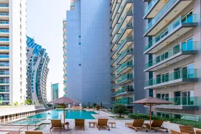 Image de A stunning studio with pool view at Damac Majestine