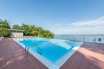 Image de Appartement 'Appartamento Sogno sul Garda' avec piscine privée, Wi-Fi et climatisation