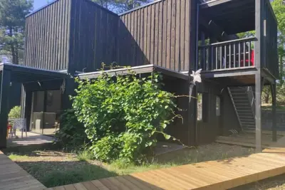 Image de Lodge en bois au lac de Lacanau à 2min de la plage\nIdéal famille!