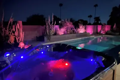 Image de Franks Oasis- 4 bedroom Resort Style Smart Home w/ Pool, Hot Tub, Fire Pits