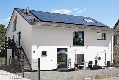 Image de Appartement 'Ferienoase Im Land Der 1000 Seen' avec terrasse privée, jardin partagé et Wi-Fi