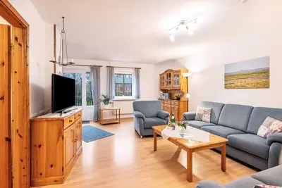 Image de Appartement 'Fereinhof Paulsen - Lachmöwe' avec terrasse privée, jardin partagé et Wi-Fi