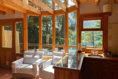 Image de Le Pommier 2 | Cabañas frente al Lago y con Pileta Climatizada