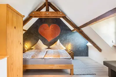 Image de Appartement 'GroĂźe Ferienwohnung 1 Mit Kamin' avec vue sur la montagne et Wi-Fi