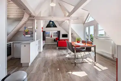 Image de Appartement 'Ferienwohnung Im Künstlerhaus' avec vue sur lac, jardin partagé et Wi-Fi