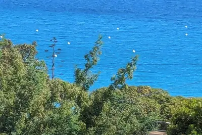 Image de Maison vue mer - Plage 150m Ă Pieds - Garage et Jardin - 8 Couchages