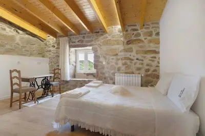 Image de Chambre de vacances \"Suite Espaçosa Quadrupla Talefe\" avec vue montagne, Wi-Fi et climatisation.