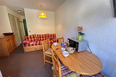 Image de Studio cosy avec coin montagne et balcon, à 100m des pistes et télésiège, casier à skis inclus