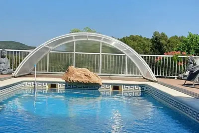Image de Homerez - Villa spacieuse à Querol avec piscine privée et jacuzzi