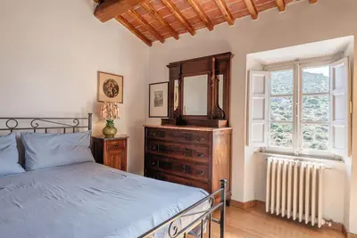 Image de Maison de vacances 'Villetta Dei Cipressi' avec terrasse privée et Wi-Fi