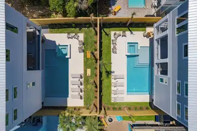 Image de Emerald Enclave by AvantStay | 18bdr Buyout | Two Stunning Homes by the Beach!