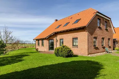 Image de Appartement \"Ostfriesland\" avec terrasse et jardin privés