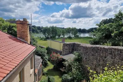 Image de Ferienhaus an der Stadtmauer mit Seeblick