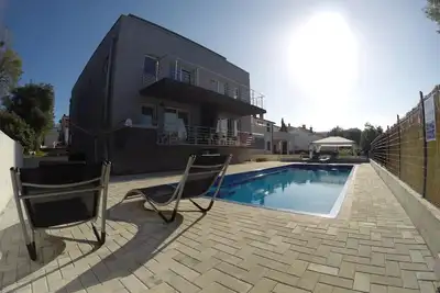 Image de Appartement de vacances Banjole pour 6 personnes avec 2 chambres à coucher - Maison mitoyenne