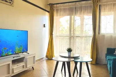 Image de Chayil Loft Mulago; 2bedroom/2bathroom, free;wifi, parking, laundry & officespace.