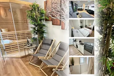 Image de The loft - 4 bedrooms - 2 Wc - 2 showers - sauna - 2 underground parking spaces
