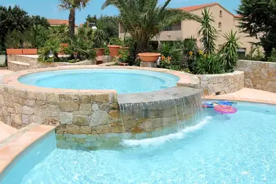 Image de Agréable appartement avec Wifi, climatisation, piscine, Tv, terrasse, animaux admis et parking