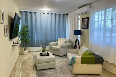 Image de Hermoso y acogedor apartamento a solo 10 minutos del aeropuerto Las Américas.