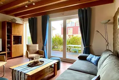 Image de 115 sqm vacation home on the dyke with terrace, 2 balconies, sea view, sauna & fireplace -