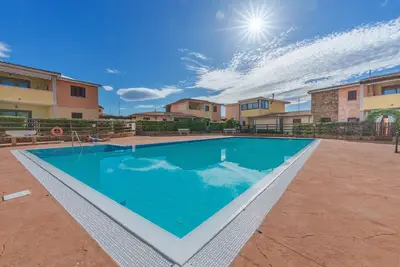 Image de Appartement 'Casa Vacanze Uva' avec piscine partagée, terrasse privée et climatisation