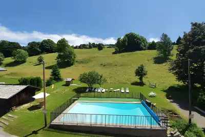 Image de Chalet \"Le Paccaly\" avec vue sur les montagnes, terrasse privée et Wi-Fi