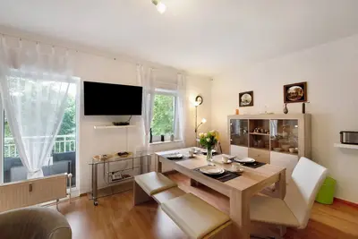 Image de Appartement \"Kinderfreundliche Wohnung Am See\" avec jardin privé, balcon et Wi-Fi