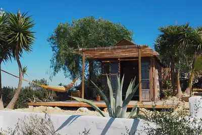 Image de Rincón Robinson - Cabaña de Madera Privada en la Finca de las Aves