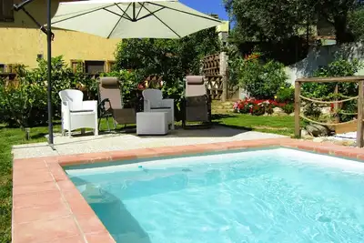 Pretty house on hillside with private pool and garden and beautiful view. . .
