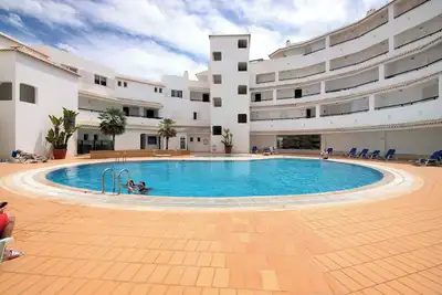 Image de Appartement 'Apartamento Pé Na Areia' avec piscine partagée, Wi-Fi et climatisation