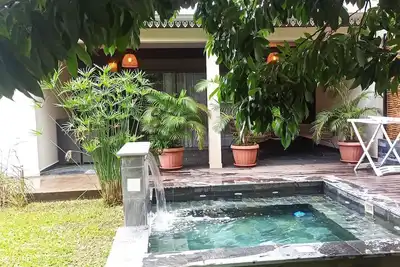 Image de Villa Hibiscus à Saint-Philippe: Élégance tropicale, 2 chambres, spa privatif et cuisine équipée