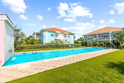 Image de CasaCuatroRositas | Luxury 2br Penthouse+Pool next to Blue Bay Golf & Beach resort