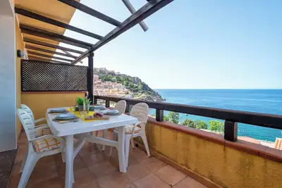 Maison de vacances 'The Terrace Above The Sea' avec vue sur la mer, terrasse privée et climatisation