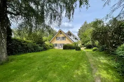 Image de Haus am See - Holiday home, shower and bathtub, lake view