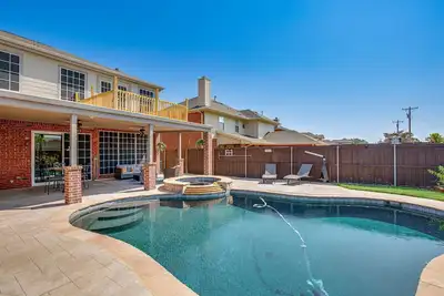 Enjoy the peace and quiet back patio with Lagoon pool.