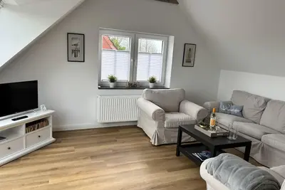 Image de Maison de vacances 'Dinas Huus' avec terrasse privée, jardin privé et Wi-Fi