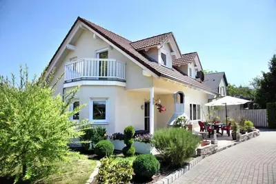 Image de Maison au bord du lac Mirow avec terrasse