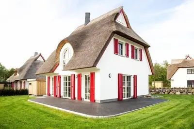 Image de Maison de Luxe CĂ´te Bodden avec Sauna
