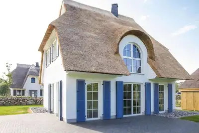 Image de Maison de Luxe CĂ´te Bodden avec Sauna