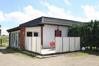 Image de Maison au bord du lac Kummerow avec Cheminée