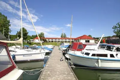 Image de Aparthotel au bord du Heidensee avec bateaux
